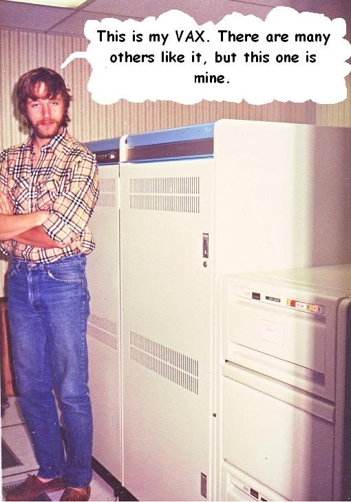 Mike Marshall standing in front of a VAX-11/780